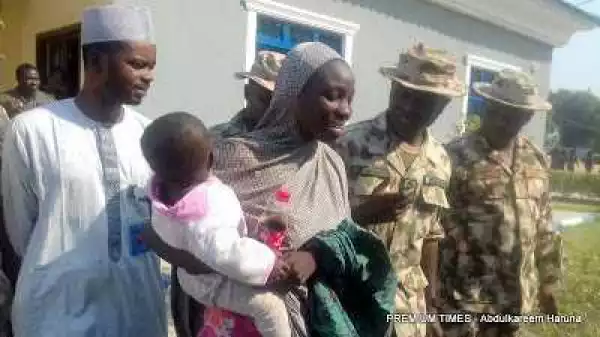 Photos: Nigerian Army hands over rescued Chibok girl and baby to Borno government